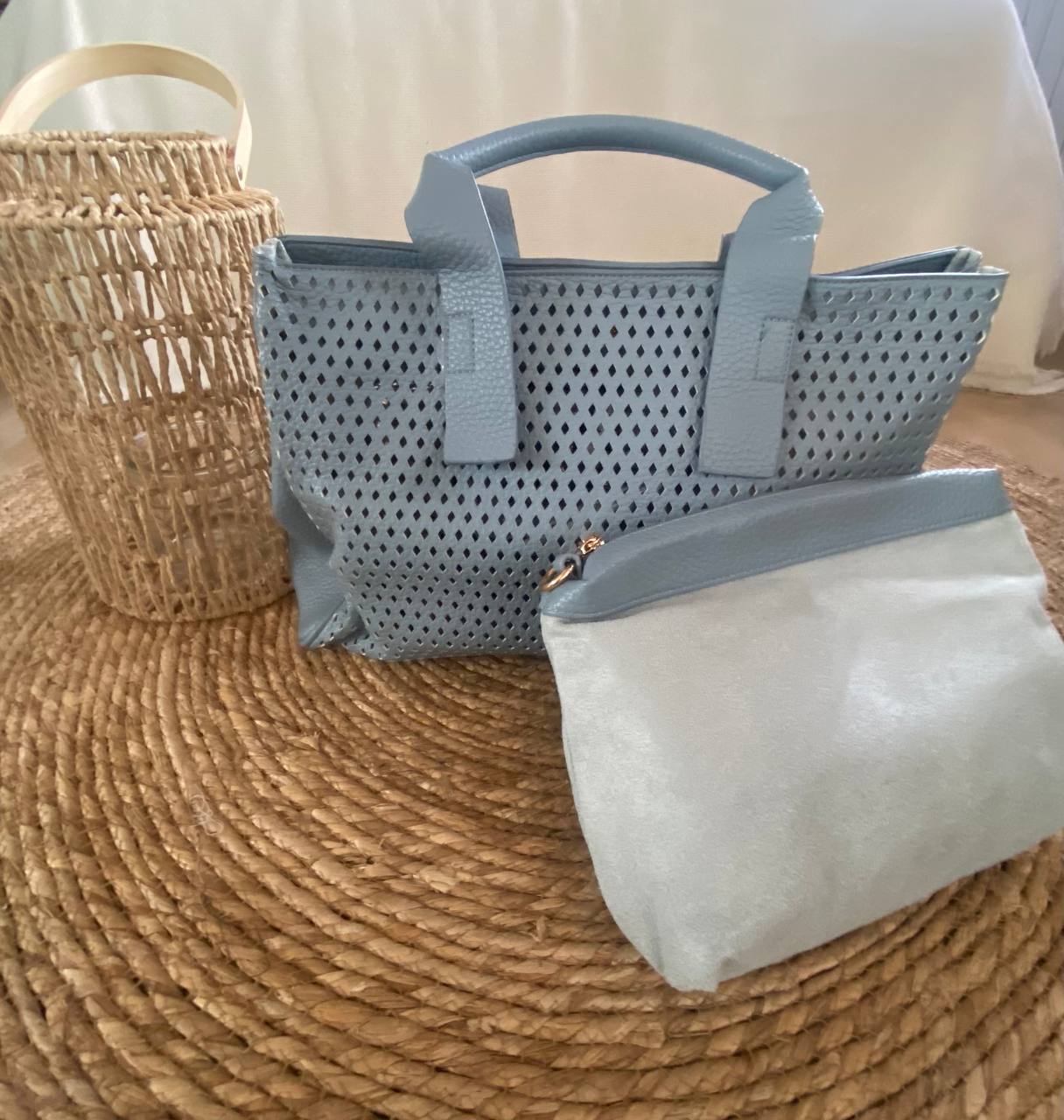 Bolso perforado azul